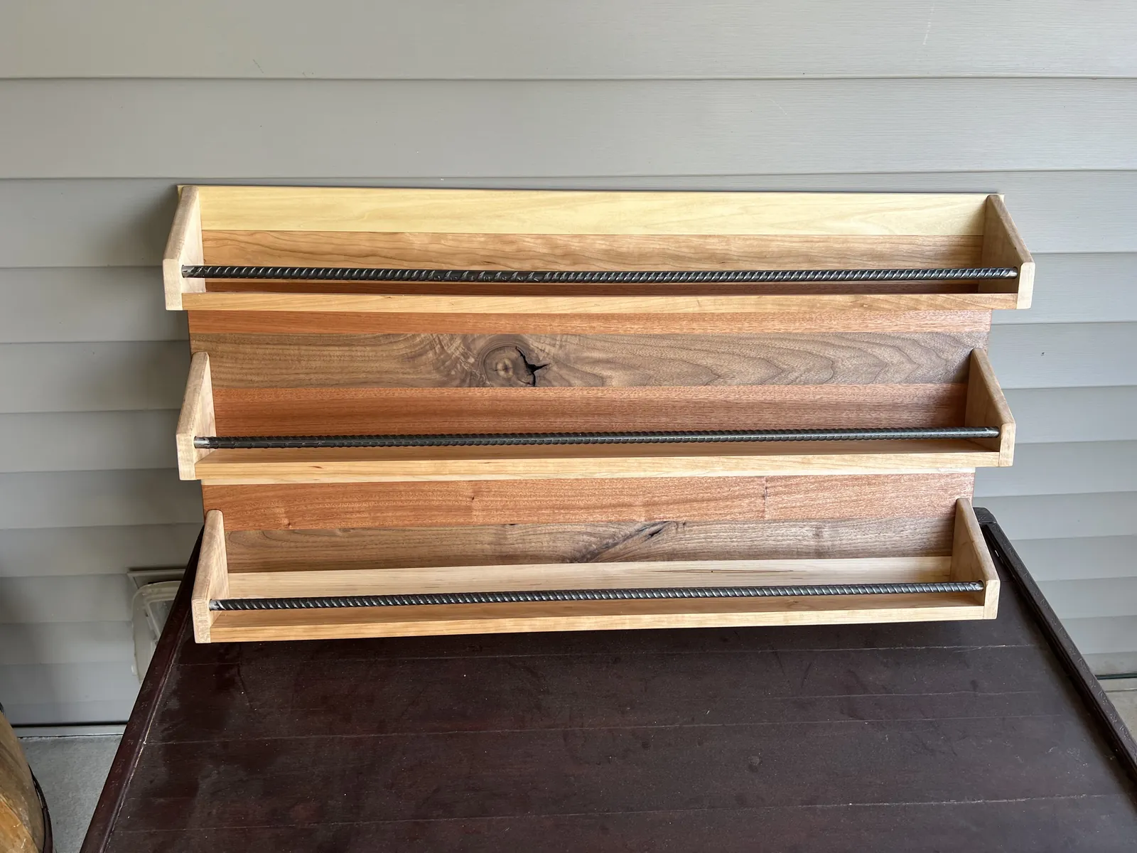Three-tier wall shelf, Cherry and walnut, rebar rails