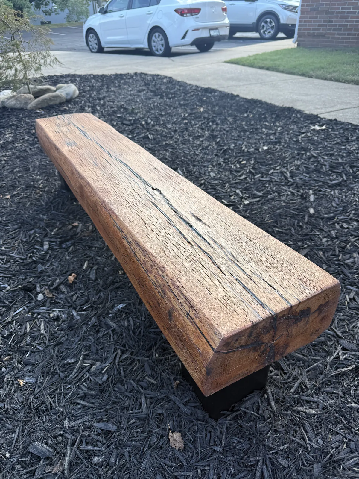 Reclaimed beam bench, Salvaged oak timber on steel legs